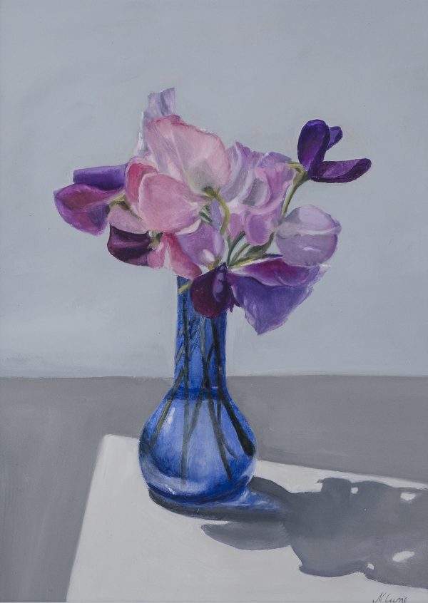 Sweet peas in a blue glass vase scaled